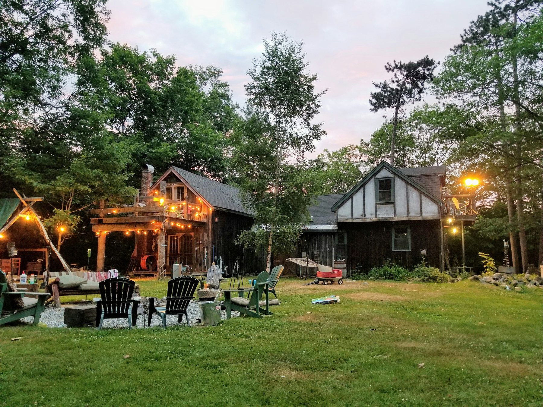 Residential yard with warm lighting and high curb appeal